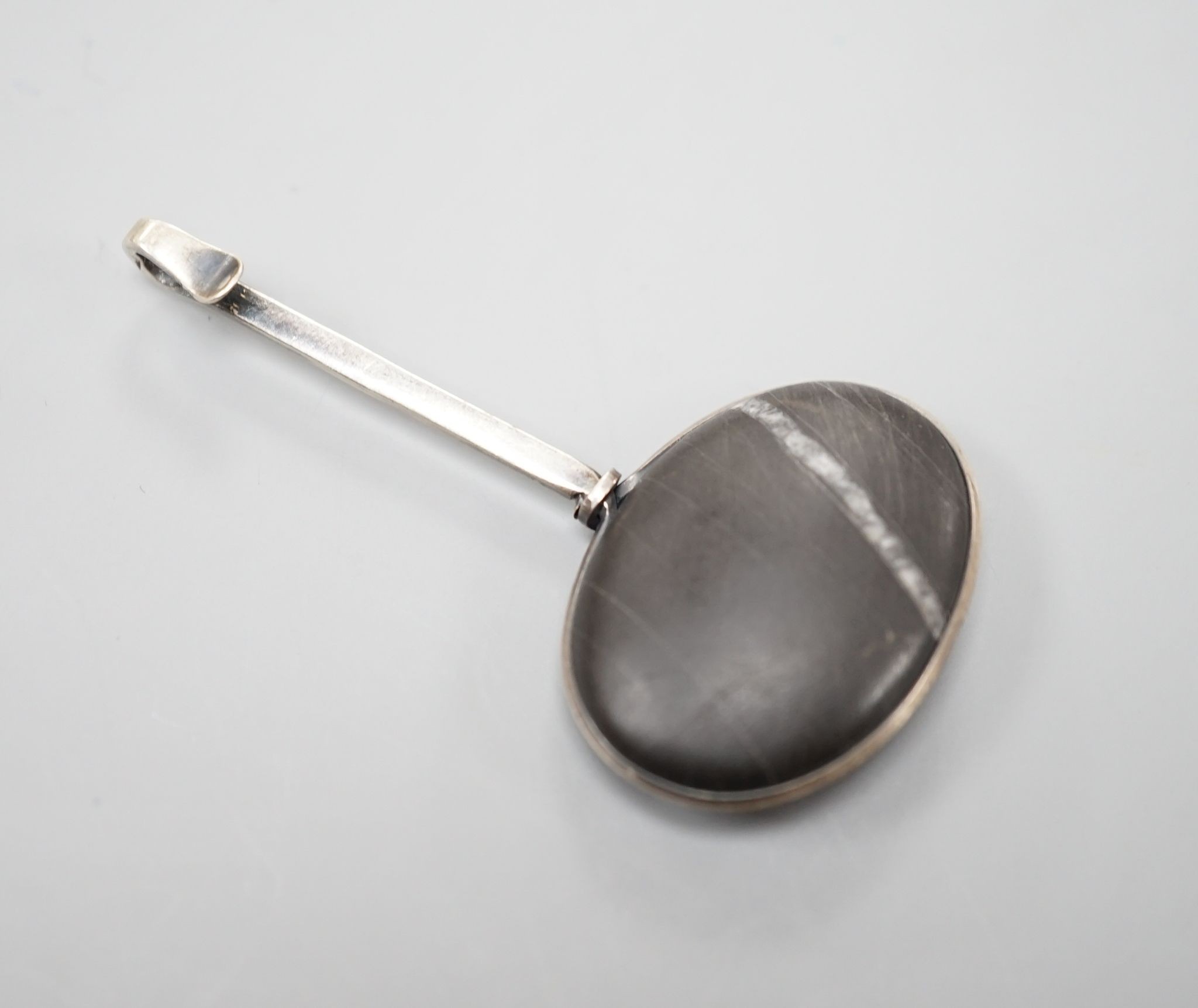 A Vivian Torun white metal and white veined black hardstone set pendant, stamped 'Torun' only with obscure fineness? mark, 59mm.